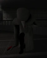 SCP-049 crouching to perform surgery.