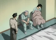 Heinz, Schumann, and Tenma after successfully treating Petra.