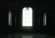 The tall window with an exhaust fan that is always seen in the opening sequence