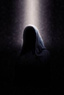 38437454-eerie-image-of-creepy-dimly-lit-faceless-cloaked-figure-in-spotlight-on-dark-background.jpg