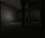 A strange big room with graffiti and columns. It might've been connected with one of the previous rooms.