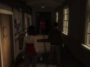 The second section of the hallway, with the two students at the end