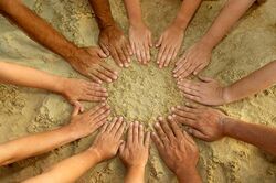 Hands-in-sand.jpg
