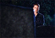 Ryan standing over Marissa's grave.