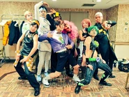 Gets in a costume with friends