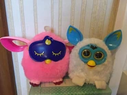 A pink Furby Connect next to a Pixy