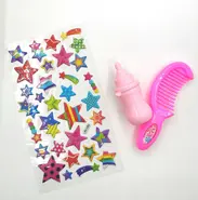 Pixy's stickers, bottle, and comb