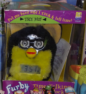 Dyed Skunk Furby clock.