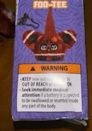 The other side of the box showing a different stock picture of Foo-Tee