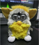 Another Banana Peel Furby with silver eyes
