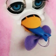 a pink Popo with its fish in its beak