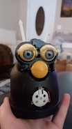Furby with yellow eyes