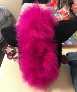A Juicy Grape Furby's mane