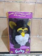 A spanish Penguin Furby with box (green eyes)