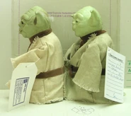 A side view of two prototype Interactive Yodas