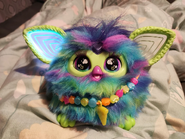 The ear glitch on an Aurora Furbealis Furby