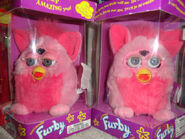 Two Pink Flamingo Furbys in their boxes