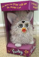 Champagne Furby with heterochromia