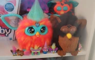 A Gorilla Furby, A Coral Hey Furby, some Furby Minis and other Furbys