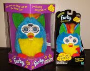 A Kid Cuisine Talking Buddy next to a Kid Cuisine Furby