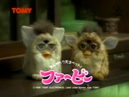 A Bear Furby with a Giraffe Furby at the end of the Japanese Commercial, "Living With Furby".