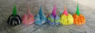 Six out of the eleven Special Edition Furby Furblets with their ears closed