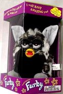 A boxed Husky Furby