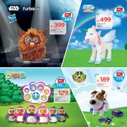 Hibou appearing in a magazine with three other toys, one of them being Furbacca.
