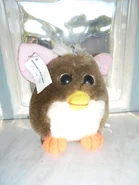 A brown Baby Loobie (tag has been ripped)