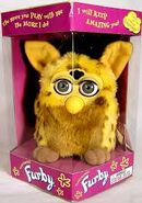 A boxed Lizard Furby