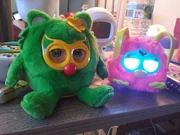 Guli Elf next to Furby Party Rocker, Loveby