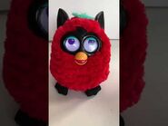 A Black Cherry Furby with the issue