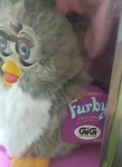 An Italian Church Mouse Furby with the Italian “Gig” logo on its paper tag