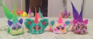 Mello-Nee alongside Loo-Lay, Can-Dee-Swirl, and Kitt-Ee-Luv