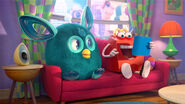 A McDonald's ad showing a Furby Connect sitting on a sofa.