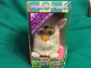 Japanese Snowball Furby with a yellowed faceplate