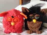 A Gorilla Furby and a Phoenix Furby