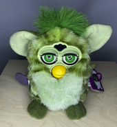 Alligator Furby with green eyes