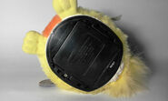 The base of a Sunny Yellow Furby Baby with a long code on its base