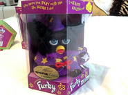 A Wizard Furby in its box