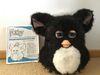 A German Furby with it‘s manual.