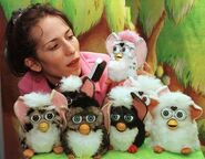 Dana Munshaw and some prototype 1998 Furbys at the American International Toy Fair in New York (Credits: Aflo and Reuters)