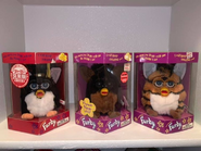 Fresh Gorilla in the middle of a Tiger Furby, and Graduation Furby
