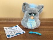 Sleepy Blue Furby with manual and spoon