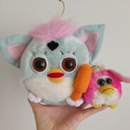 A Baby Blue YUJIN plush with a keychain Furdy