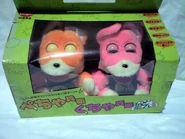 Kucha and Pecha with their eyes shut in their box