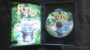 The inside of the case for the Spanish version of Furby Island