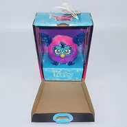 The Furbling inside its box