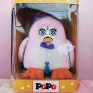 A pink Popo in its box