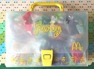 A case of McFurby keychains with a yellow handle